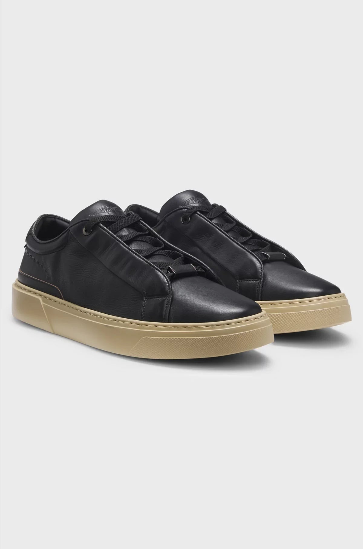 TRAINERS IN GRAINED LEATHER